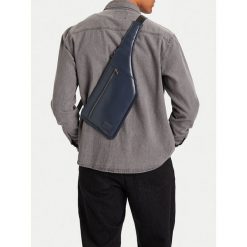 Saszetka G-Star Raw. Niebieskie saszetki męskie G-Star Raw, bez wzorów, małe. Za 149.99 zł.