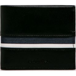 Calvin Klein - Portfel skórzany. Czarne portfele męskie Calvin Klein, bez wzorów, z materiału. Za 269.90 zł.
