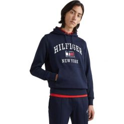 Bluza z kapturem Tommy Hilfiger Modern Varsity, Mężczyźni. Niebieskie bluzy nierozpinane męskie Tommy Hilfiger, m, bez wzorów, z bawełny, z kapturem. Za 590.00 zł.