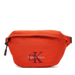 Saszetka nerka Calvin Klein. Brązowe saszetki męskie Calvin Klein, bez wzorów, małe. Za 249.99 zł.