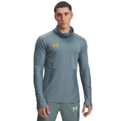 Dżersej z długim rękawem Under Armour Challenger Pro. Niebieskie koszulki męskie z długim rękawem Under Armour, bez wzorów, z dżerseju, sportowe, bez kołnierzyka, bez ramiączek. Za 348.50 zł.