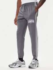 Under Armour Spodnie dresowe Ua Rival Fleece Colorblock 6003954 Szary Loose Fit. Szare spodnie dresowe męskie Under Armour, bez wzorów, z bawełny. Za 209.99 zł.