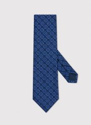 PAKO LORENTE – Niebieski krawat męski w geometryczny wzór. Niebieskie krawaty i muchy męskie Pako Lorente, bez wzorów, z poliesteru. Za 99.99 zł.