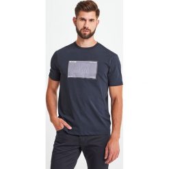 T-SHIRT ARMANI EXCHANGE. T-shirty męskie Armani Exchange, m, bez wzorów, bez kołnierzyka, bez ramiączek. Za 219.00 zł.