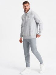 Spodnie męskie dresowe joggery - szary melanż V3 - Rozmiar: L. Szare spodnie dresowe męskie Ombre Clothing, bez wzorów, z bawełny. W wyprzedaży za 69.99 zł.