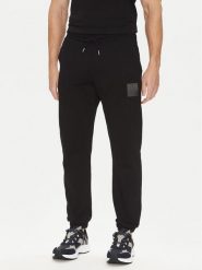 HUGO Spodnie dresowe Dusplitan 50542866 Czarny Relaxed Fit. Czarne spodnie dresowe męskie Hugo, bez wzorów, z bawełny. Za 349.99 zł.