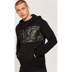 Bluza z kontrastowymi wstawkami - Czarny. Bluzy nierozpinane męskie marki DOMYOS. W wyprzedaży za 69.99 zł.