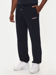 Guess Jeans Spodnie dresowe M4YB18 K9V31 Granatowy Regular Fit. Niebieskie spodnie dresowe męskie Guess Jeans, z aplikacjami, z bawełny. Za 239.99 zł.