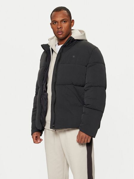 Champion Kurtka zimowa 220348 Czarny Regular Fit. Czarne kurtki męskie CHAMPION, na zimę, m, bez wzorów, z syntetyku, bez ramiączek, bez kaptura. Za 479.99 zł.