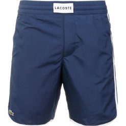 Lacoste Szorty kąpielowe marine. Niebieskie kąpielówki męskie Lacoste, z materiału, marine. Za 389.00 zł.