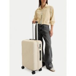 Walizka średnia Reebok. Brązowe walizki męskie Reebok, bez wzorów, średnie. Za 319.99 zł.