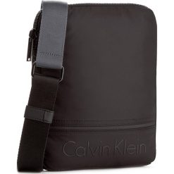 Saszetka CALVIN KLEIN - Matthew Flat Crossover K50K502881 001. Saszetki męskie Calvin Klein. W wyprzedaży za 219.00 zł.