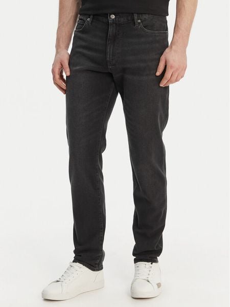 Tommy Hilfiger Jeansy Denton Lux MW0MW42321 Szary Regular Fit. Szare jeansy męskie Tommy Hilfiger, bez wzorów, z bawełny. Za 569.99 zł.