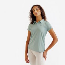 Koszulka polo z krótkim rękawem Club - zielona. Zielone koszulki polo męskie FOUGANZA, bez wzorów, z elastanu, sportowe, bez kołnierzyka, bez ramiączek. Za 59.99 zł.