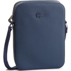 Saszetka LACOSTE - NH2179CE Peacoat 021. Saszetki męskie marki Lacoste. W wyprzedaży za 479.00 zł.