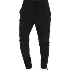 Under Armour SPORTSTYLE ELITE Spodnie materiałowe black. Długie spodnie sportowe męskie marki Under Armour. Za 419.00 zł.