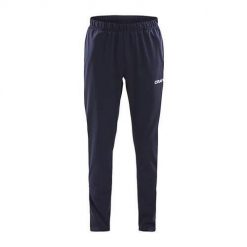 Spodnie treningowe męskie Craft Squad. Niebieskie długie spodnie sportowe męskie Craft, bez wzorów, z dresówki, na fitness i siłownię. Za 177.00 zł.