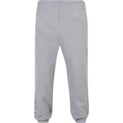 Spodnie dresowe Urban Classics Ultra Heavy. Szare spodnie dresowe męskie Urban Classics, bez wzorów, z bawełny. Za 267.50 zł.