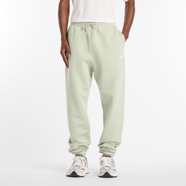 Spodnie męskie New Balance MP41503GAS – miętowe. Zielone spodnie dresowe męskie New Balance, bez wzorów, z bawełny. Za 249.99 zł.
