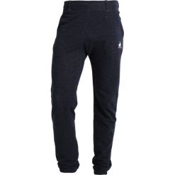 Le coq sportif TRI PANT SLIM FIT Spodnie treningowe sky captain. Długie spodnie sportowe męskie marki le coq sportif. Za 359.00 zł.