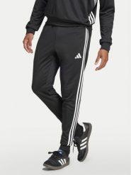 Adidas Spodnie dresowe Tiro 25 Essentials Sweat JC5464 Czarny Regular Fit. Czarne długie spodnie sportowe męskie ADIDAS, bez wzorów, z dresówki, do piłki nożnej. Za 149.99 zł.