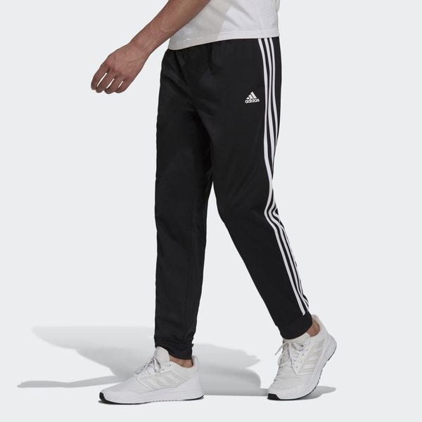 Spodnie męskie adidas Primegreen Essentials Warm-Up Tapered 3-Stripes Track. Białe spodnie dresowe męskie ADIDAS, bez wzorów, z dresówki. Za 147.00 zł.