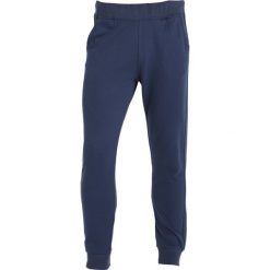 Le coq sportif Spodnie treningowe dress blues. Długie spodnie sportowe męskie marki le coq sportif. W wyprzedaży za 343.20 zł.