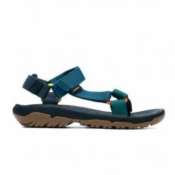 Buty do chodzenia męskie Teva Hurricane Xlt2. Niebieskie buty trekkingowe męskie Teva, bez wzorów, z materiału, sportowe, bez obcasa, bez zapięcia. Za 371.00 zł.