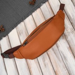 Saszetka nerka męska skórzana na pas koniakowa skóra naturalna Abruzzo ABR-51-CG. Czarne saszetki męskie z aplikacjami, z nylonu. Za 84.00 zł.