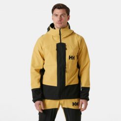 Płaszcz przeciwdeszczowy Helly Hansen Odin Bc Softshell. Brązowe kurtki softshell męskie Helly Hansen, m, bez wzorów, z softshellu, bez kaptura. Za 1,333.00 zł.
