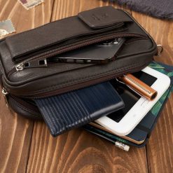 Paolo Peruzzi Saszetka męska skórzana do ręki z miejscem na telefon brązowa T-132-BR. Brązowe saszetki męskie Paolo Peruzzi, bez wzorów. Za 178.31 zł.