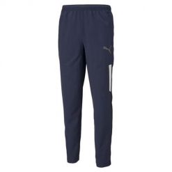 Spodnie treningowe męskie Puma Teamliga Sideline. Niebieskie długie spodnie sportowe męskie Puma, bez wzorów, z dresówki, do piłki nożnej. Za 285.00 zł.