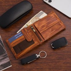 Portfel skórzany męski poziomy klasyczny brązowy RFiD Beltimore D34. Brązowe portfele męskie bez wzorów. Za 59.90 zł.