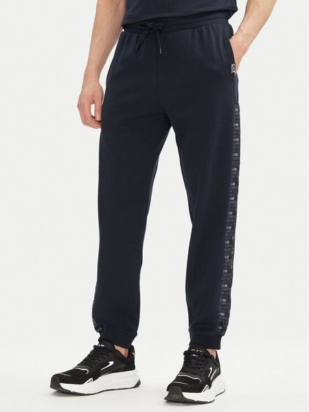 EA7 Emporio Armani Spodnie dresowe 7M000216 AF12660 UB102 Granatowy Regular Fit. Niebieskie spodnie dresowe męskie EA7 Emporio Armani, bez wzorów, z dresówki. Za 469.99 zł.
