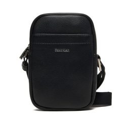 Saszetka Calvin Klein. Czarne saszetki męskie Calvin Klein, bez wzorów, małe. Za 289.99 zł.