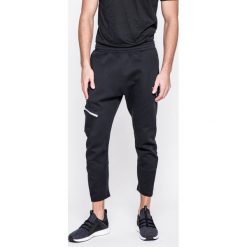 Puma - Spodnie Evo Tactile Pants Puma Black. Długie spodnie sportowe męskie Puma. W wyprzedaży za 139.90 zł.