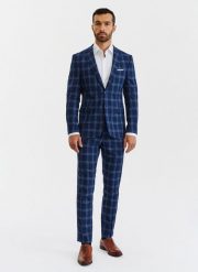 PAKO LORENTE – Granatowe spodnie garniturowe w niebieską kratę. Niebieskie eleganckie spodnie męskie Pako Lorente, bez wzorów, z elastanu. Za 149.99 zł.