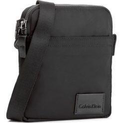 Saszetka CALVIN KLEIN - Ease Mini Reporter K50K503467 001. Saszetki męskie marki Calvin Klein. W wyprzedaży za 249.00 zł.