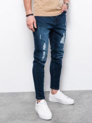 Spodnie męskie jeansowe SLIM FIT - niebieskie V1. Niebieskie spodnie na co dzień męskie Ombre Clothing, bez wzorów, z bawełny. W wyprzedaży za 89.99 zł.