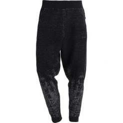 Adidas Performance PULSE Spodnie treningowe black/owhite. Długie spodnie sportowe męskie adidas Performance. W wyprzedaży za 359.40 zł.