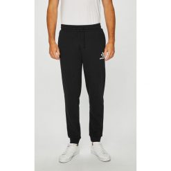 Converse - Spodnie. Szare spodnie na co dzień męskie Converse, z bawełny, casualowe. Za 199.90 zł.