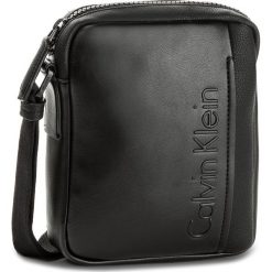 Saszetka CALVIN KLEIN - Elevated Logo Mini R K50K503610 001. Saszetki męskie marki Calvin Klein. W wyprzedaży za 249.00 zł.