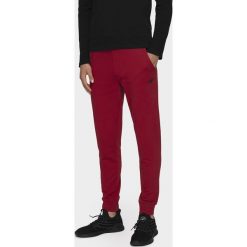 Spodnie dresowe męskie SPMD300 - ciemna czerwień. Spodnie dresowe męskie 4f. Za 119.99 zł.