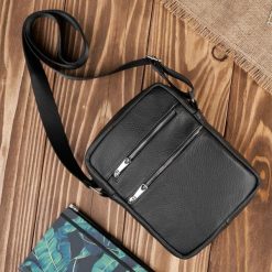 Saszetka męska skórzana torba męska na ramię czarna Abruzzo ABR-05. Czarne saszetki męskie bez wzorów, z nylonu. Za 139.99 zł.