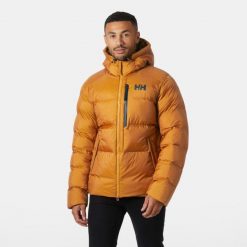 Kurtka z kapturem Helly Hansen Active Winter. Brązowe kurtki męskie Helly Hansen, bez wzorów, z puchu, sportowe, bez ramiączek, z kapturem. W wyprzedaży za 1,157.50 zł.