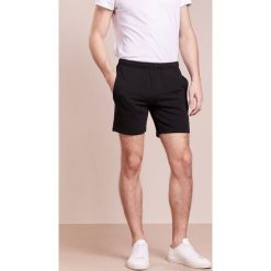 Ron Dorff EYELET EDITION Spodnie treningowe black. Czarne spodnie dresowe męskie Ron Dorff, z bawełny. W wyprzedaży za 356.30 zł.