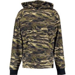 Puma Bluza z kapturem puma black. Bluzy nierozpinane męskie Puma. W wyprzedaży za 503.20 zł.