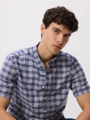Koszula regular fit w kratę - granatowy. Niebieskie koszule męskie Reserved, l, bez wzorów, z bawełny, bez kołnierzyka, bez ramiączek. W wyprzedaży za 79.99 zł.