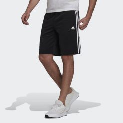 Spodenki rozgrzewające z 3 paskami adidas Essentials. Białe szorty sportowe męskie ADIDAS, bez wzorów, sportowe. Za 111.00 zł.