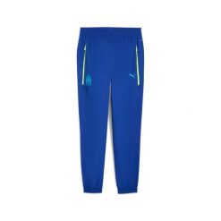 Spodnie dresowe OM Woven 2025/26. Niebieskie spodnie dresowe męskie Puma, bez wzorów, z dresówki. Za 332.00 zł.